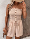Perfee Decorative Button Smocked Strapless Romper