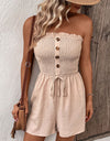 Perfee Decorative Button Smocked Strapless Romper