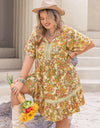 Plus Size Printed Tie Neck Short Sleeve Mini Dress